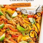 Sheet pan with cooked chicken fajita strips, colorful bell peppers, lime wedges, foil-wrapped sauce, and recipe button.