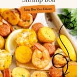 Sheet pan shrimp boil with shrimp, sausage, corn, potatoes; garnished with parsley, lemon; text promotes easy recipe.