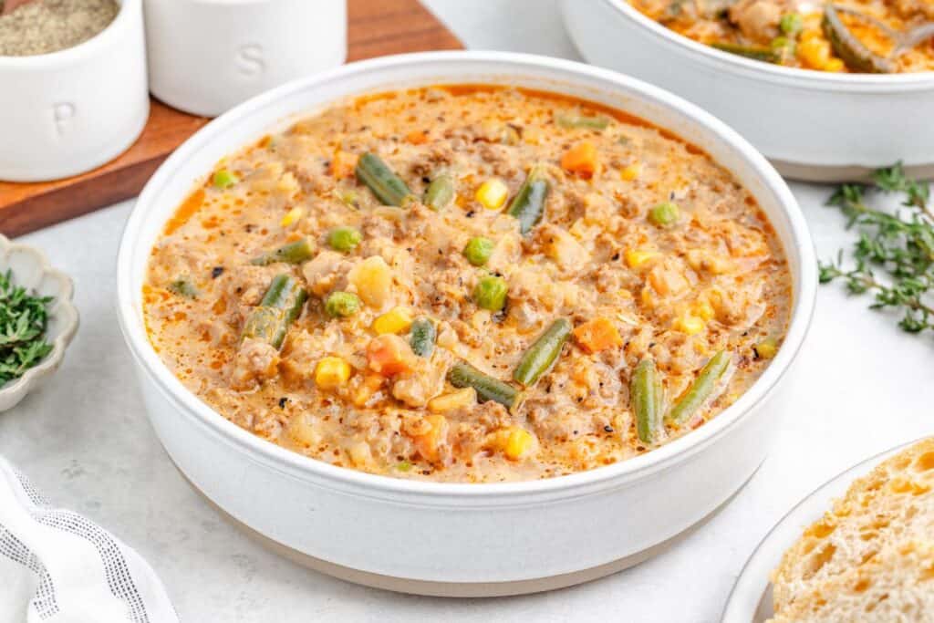 Bowl of creamy shepherd's pie soup with thick seasoned broth.