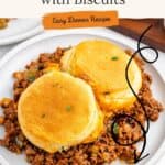 Sloppy joe casserole with two golden biscuits on a plate; recipe title and Get the recipe button overlayed.